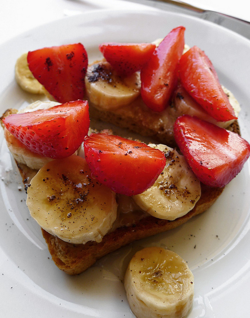 Strawberries and banana on toast